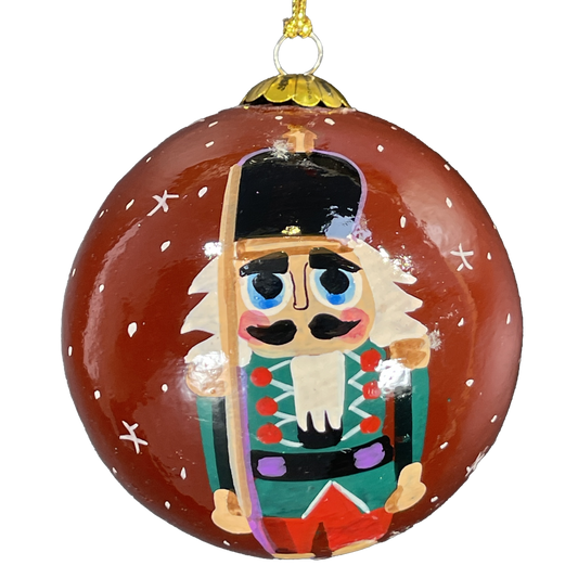 Decorative Christmas ornament with a hand painted nutcracker design