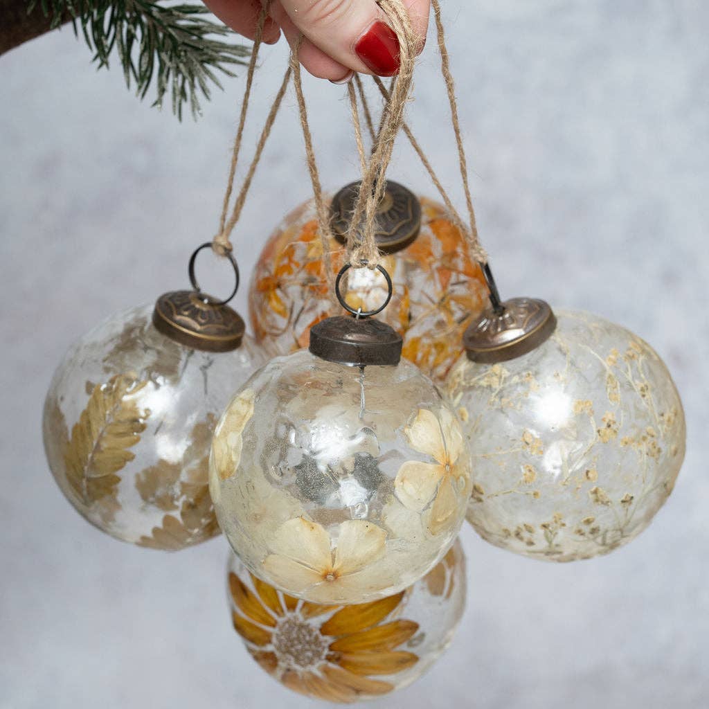 Detail of the floral design inside a handmade glass bauble