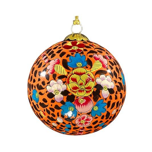 Decorative orange hand painted bauble with floral patterns