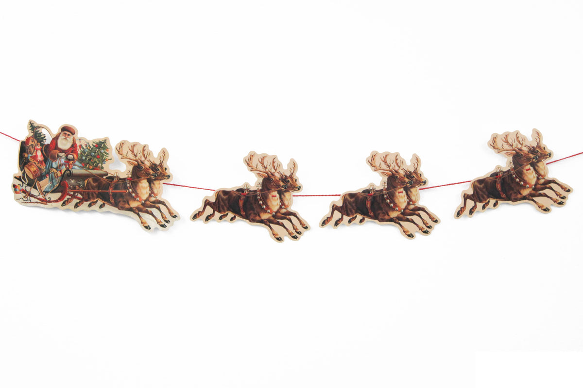 Embossed Santa and reindeer scene from a Mamelok paper garland