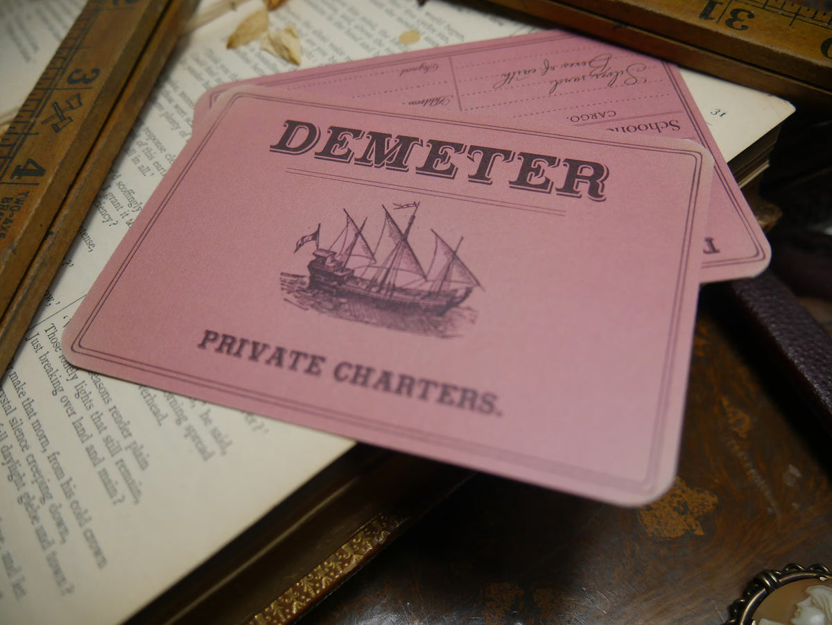 Dracula bookmark styled as a pink Demeter Private Charters cargo receipt with a sailing ship engraving
