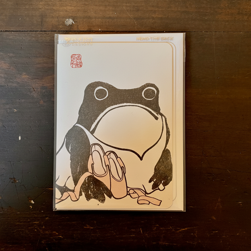 greeting card with a frog illustration with ballet shoes