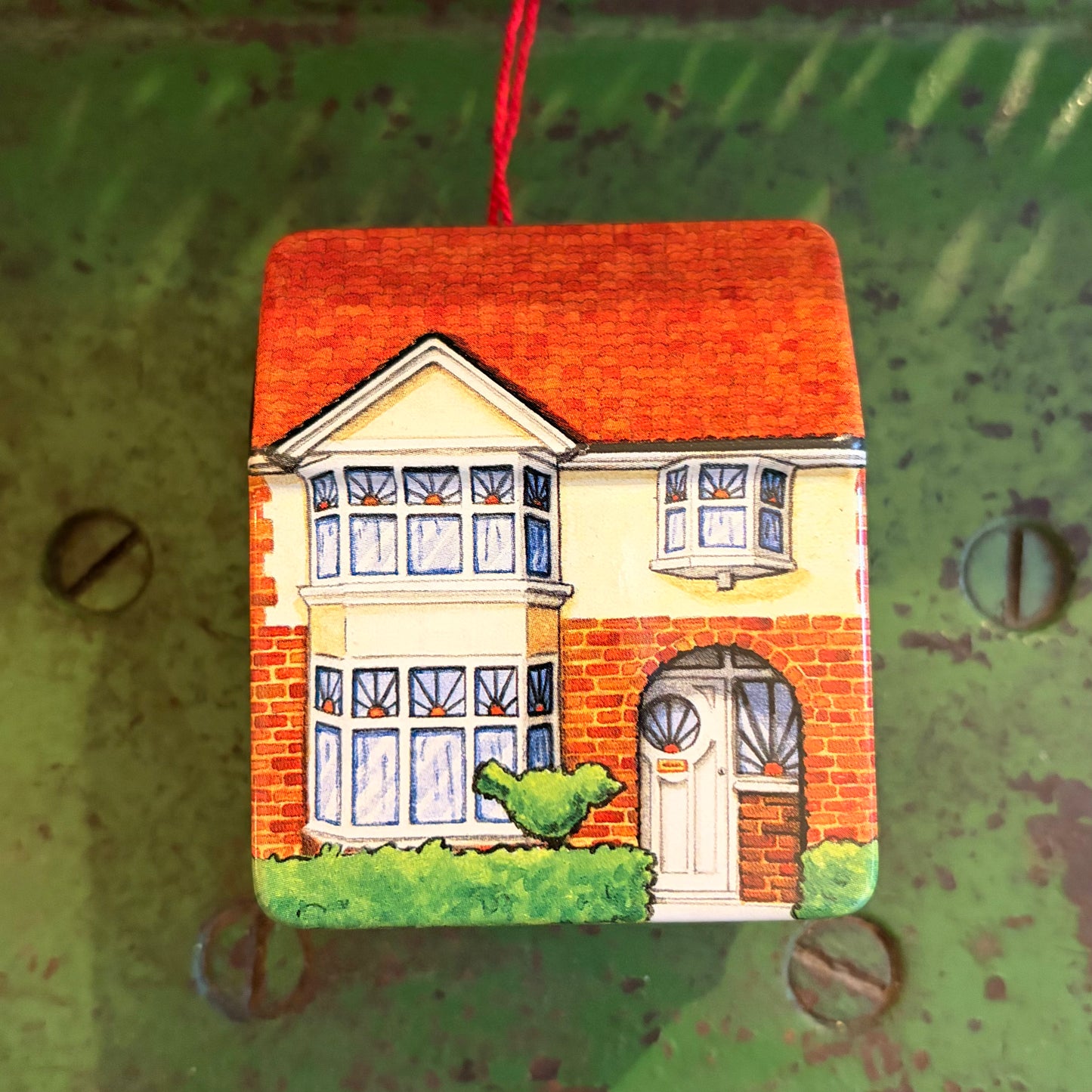 Tudor house design sweetie tin by Dana Kubick