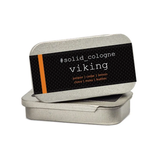 Viking; sustainable solid cologne fragrance in rectangular tin with orange details