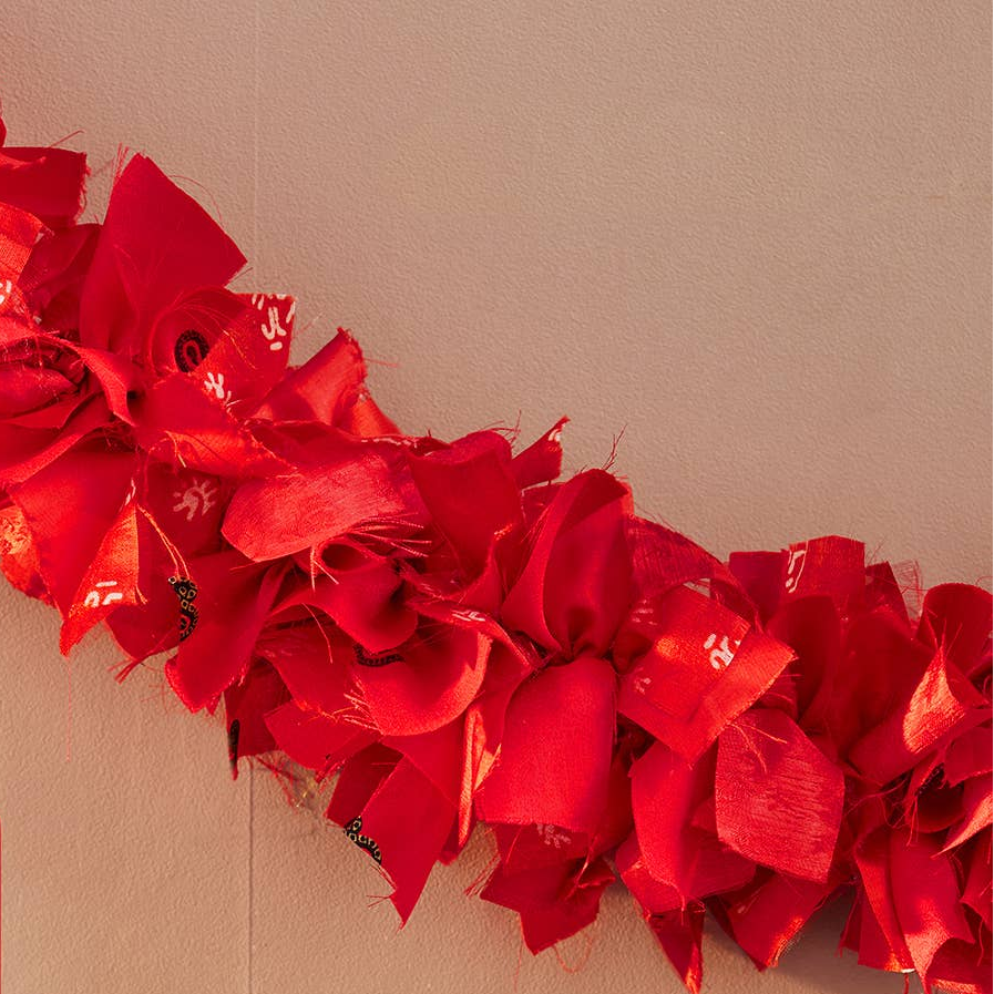Namaste recycled red sari festive garland