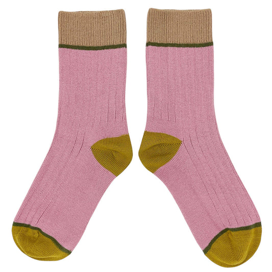 Pair of pink socks with brown tops and yellow toes