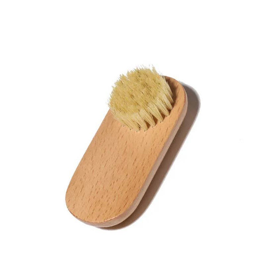 Facial brush with goat hair bristles, photographed from above