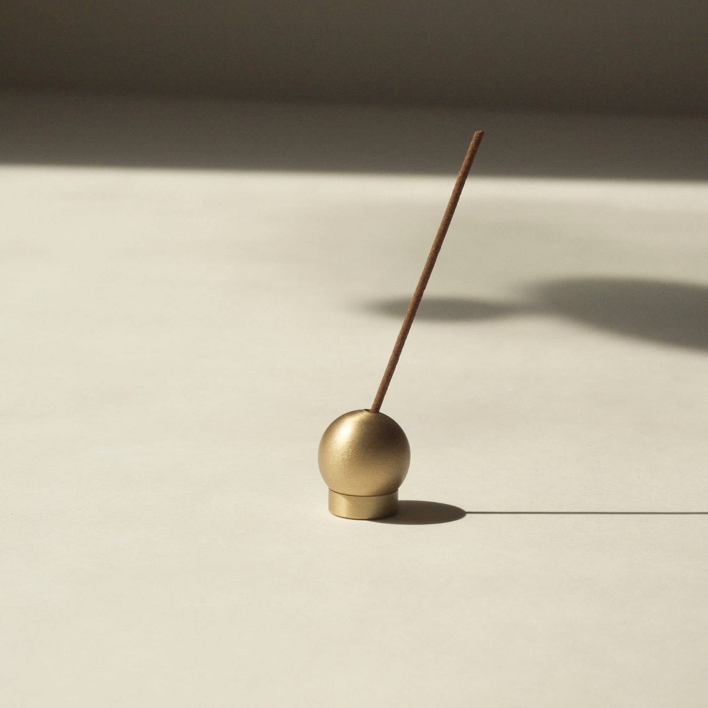 minimal incense holder in brass