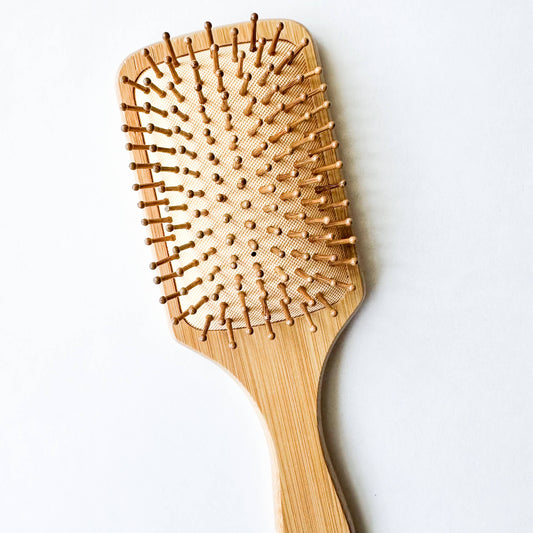 lose-up of large bamboo bristles on sustainable hairbrush