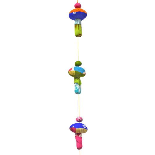 Colorful mushroom-shaped hanging decoration on a white background