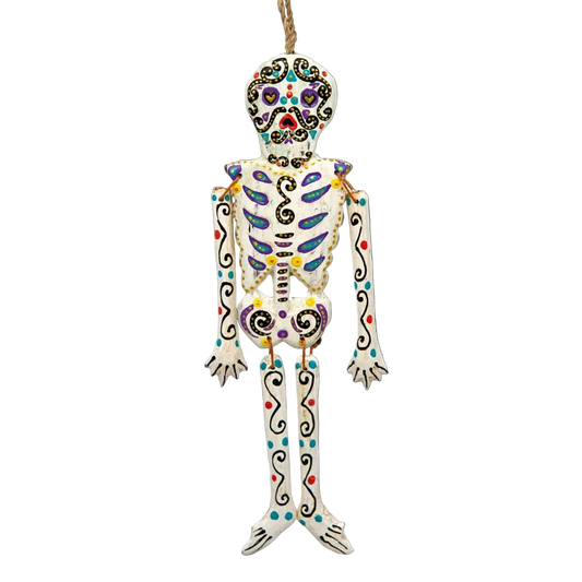 Small wooden candy skull skeleton ornament with twine-jointed limbs