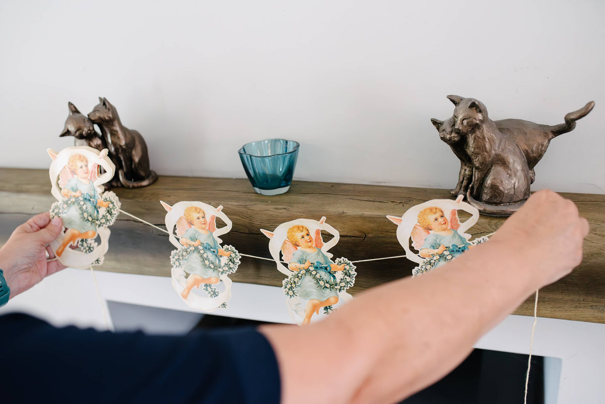 Vintage-style cherub paper garland, made in Great Britain