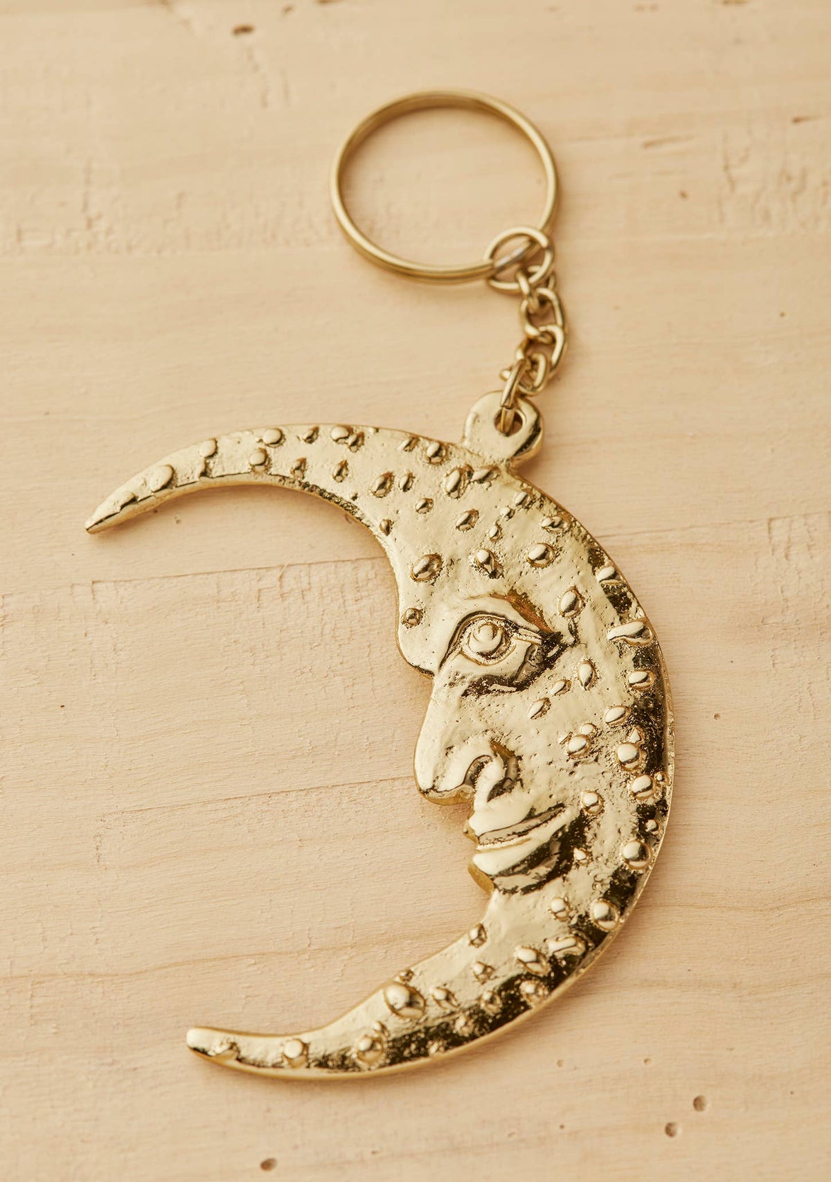 Double-sided moon face keyring handcrafted in India