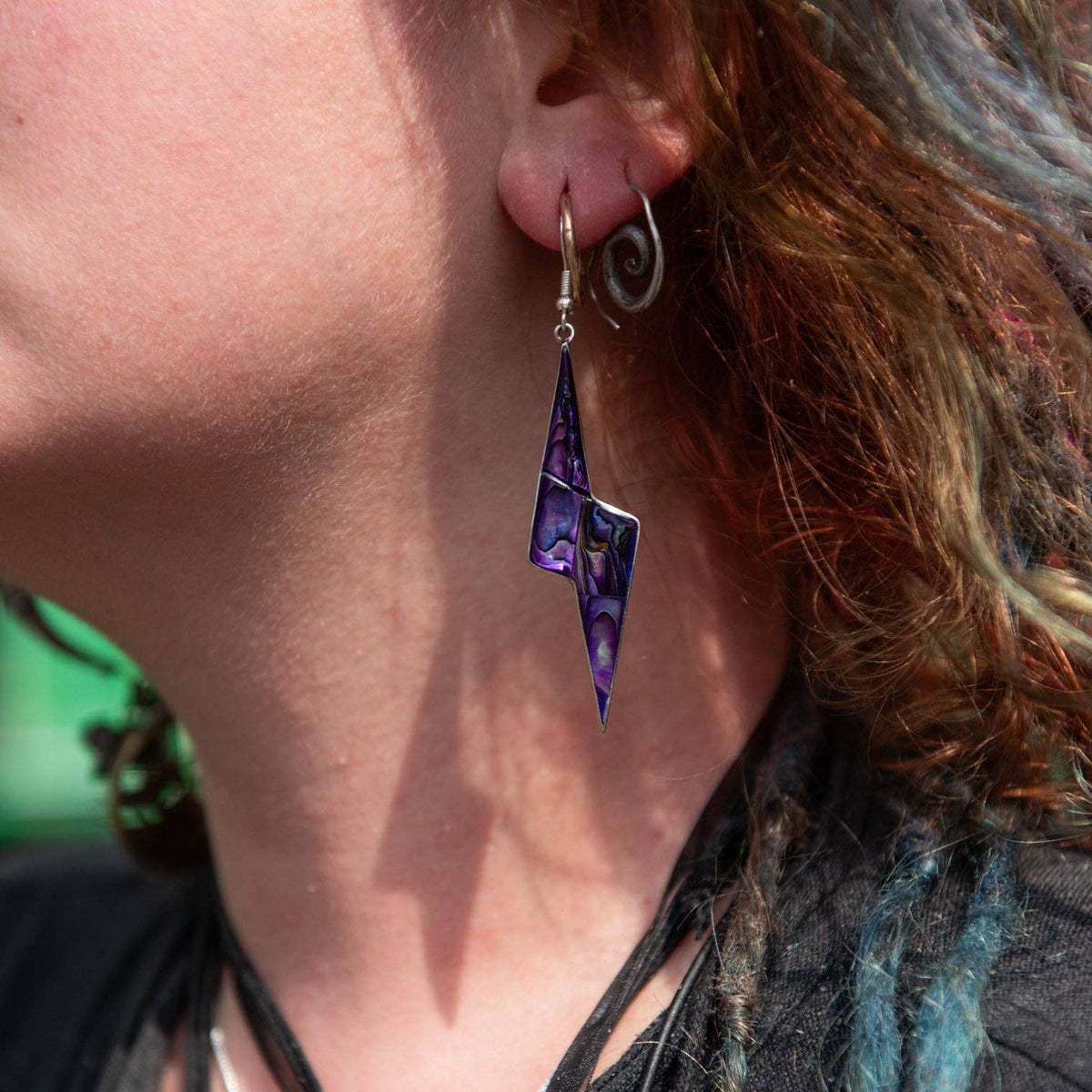 Purple lightning bolt earrings with silver-plated hooks