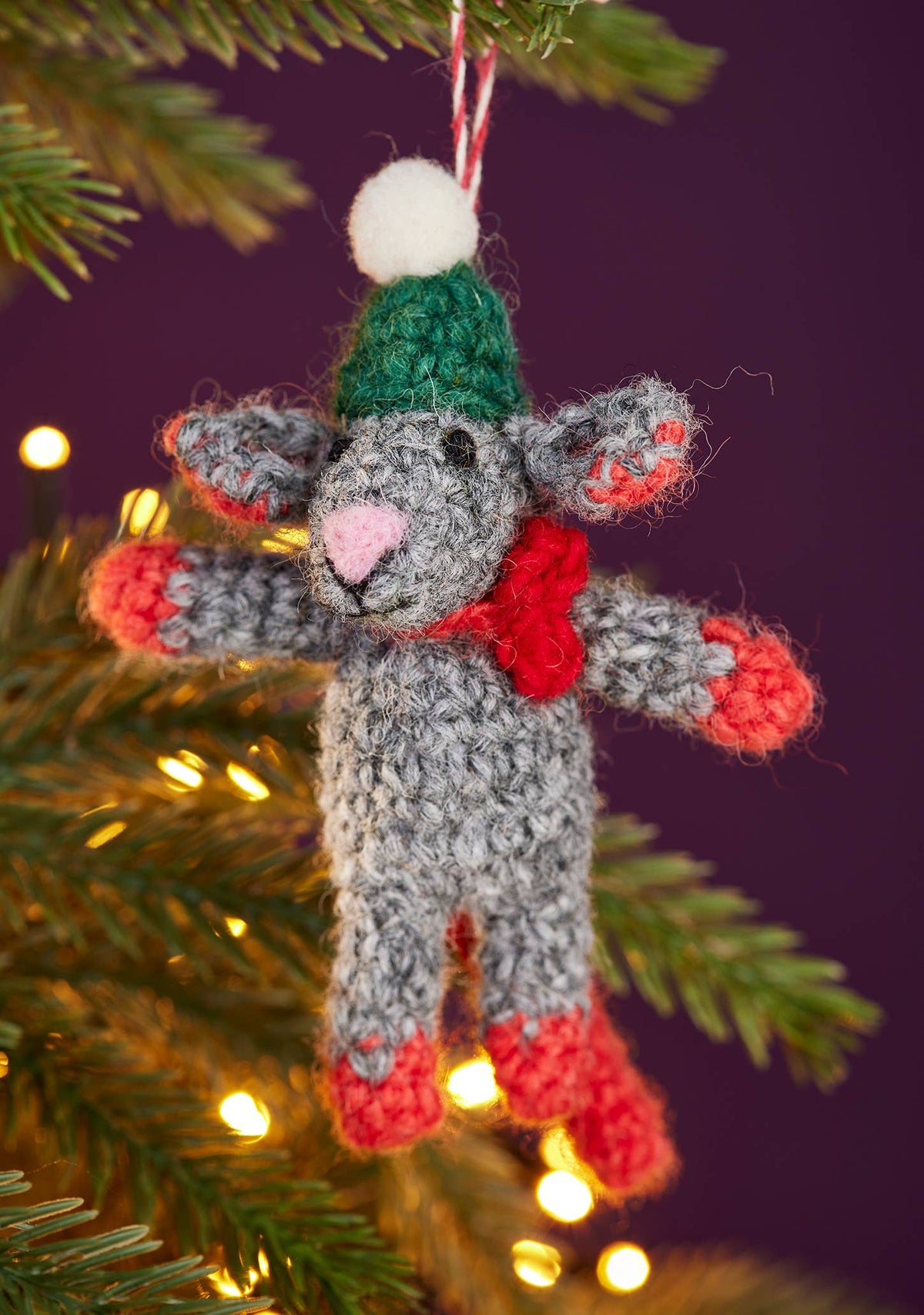 Grey crochet mouse Christmas decoration in a felt bobble hat and red scarf