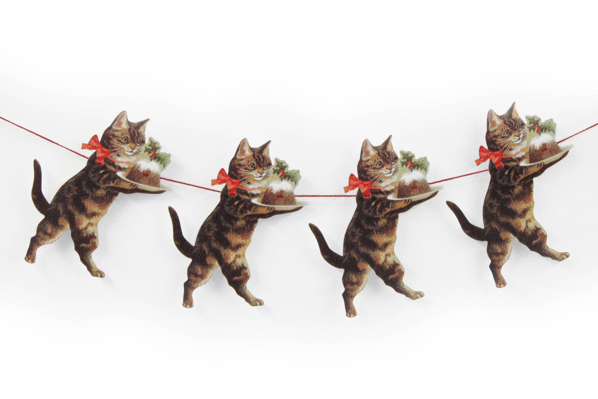 Die-cut cat with Christmas pudding from a vintage-style paper garland