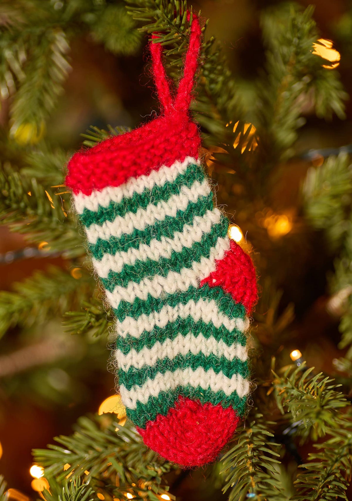 Miniature knitted wool stocking decoration, handmade in Nepal