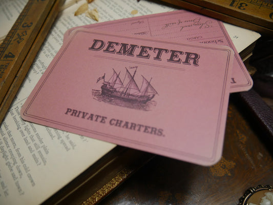 Dracula bookmark styled as a pink Demeter Private Charters cargo receipt with a sailing ship engraving