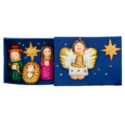 Navy blue hand-painted matchbox with a miniature nativity inside