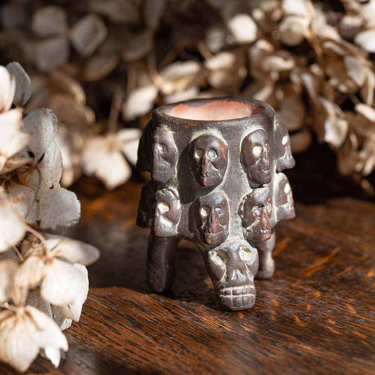 Small handmade Mexican ceramic skull pot