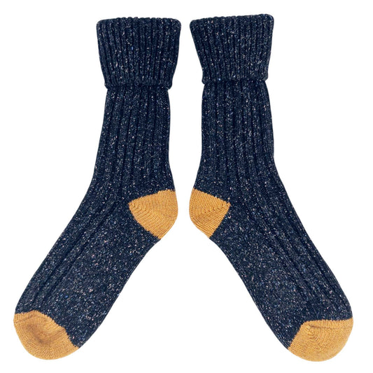 Pair of dark blue wool socks with mustard yellow toes and cuffs 