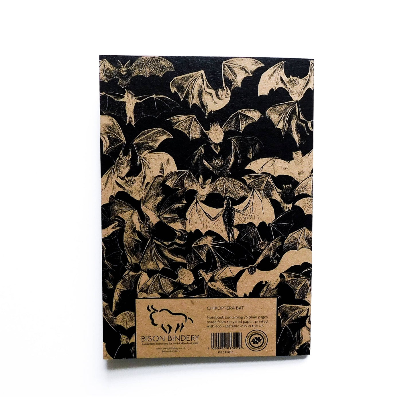 Notebook with bat pattern on black cover, Bison Bindery branding visible