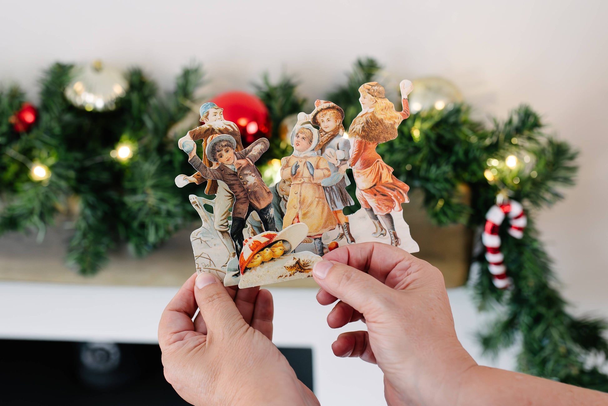 person holding vintage style snowball fight 3d greetings card