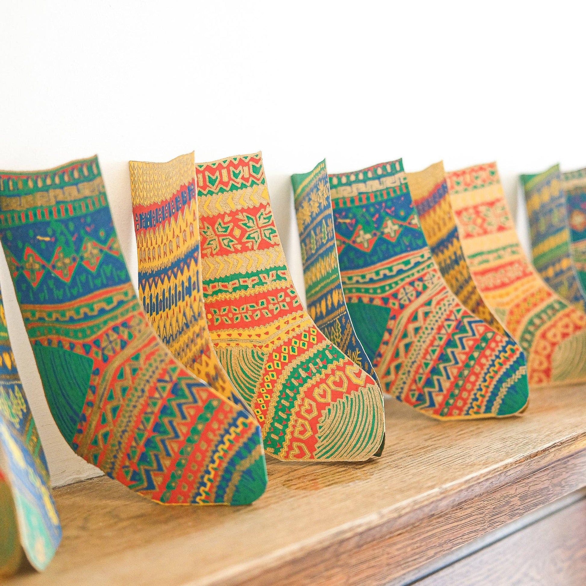 East End Press Recycled paper socks garland