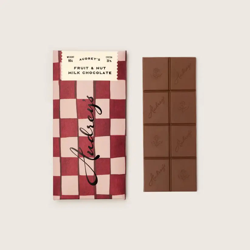 Audrey's Chocolates milk 38% fruit and nut bar, whole almonds and hazelnuts visible through the chocolate