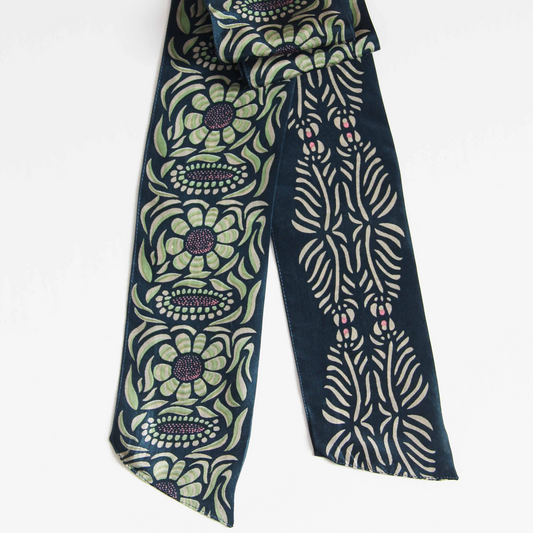 Scarf with floral and abstract patterns 