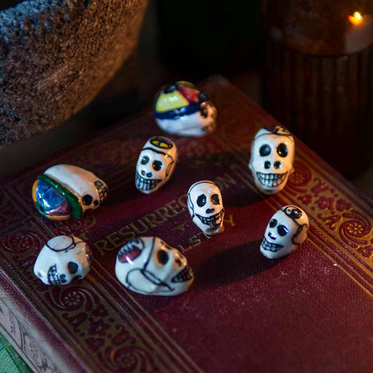 Hand-painted clay skull beads from Cusco, Peru