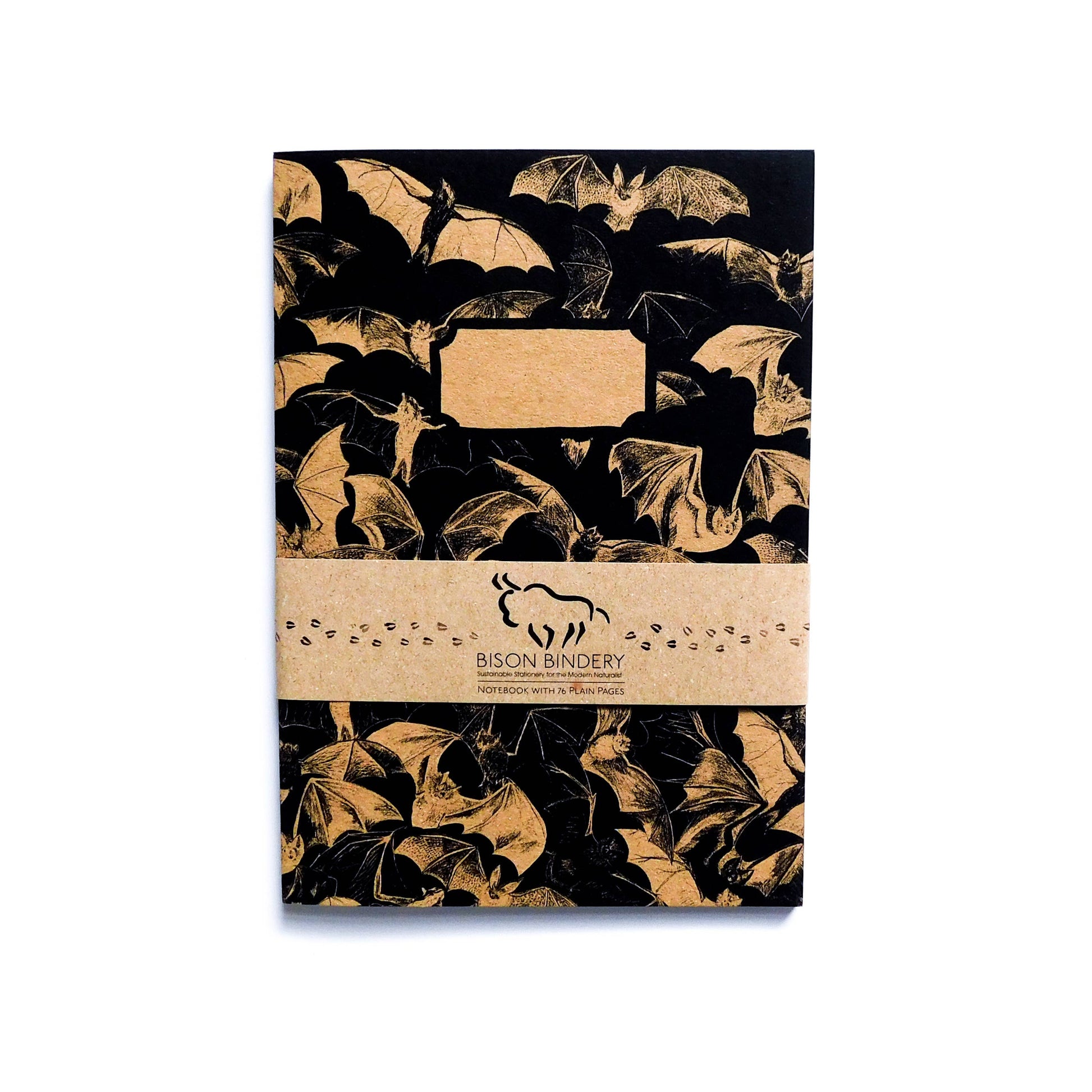 Notebook with bat pattern on black background recycled paper and Bison Bindery branding.