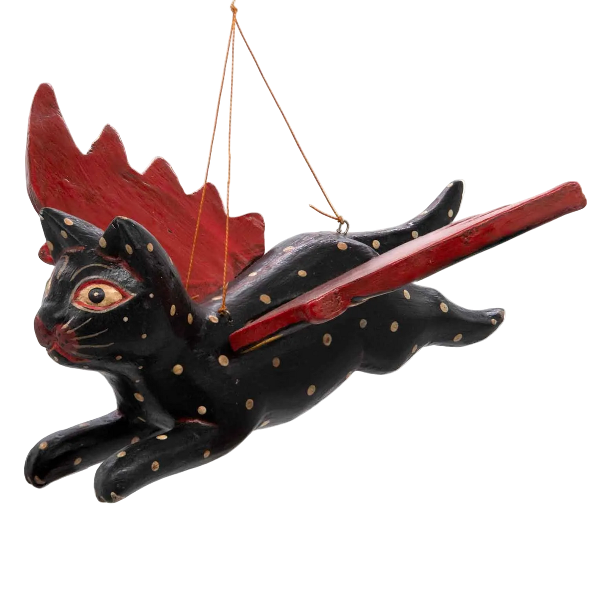 Hand-carved black flying cat with red-tipped wings, made in Bali