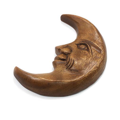 Grain of the acacia wood on a carved crescent moon